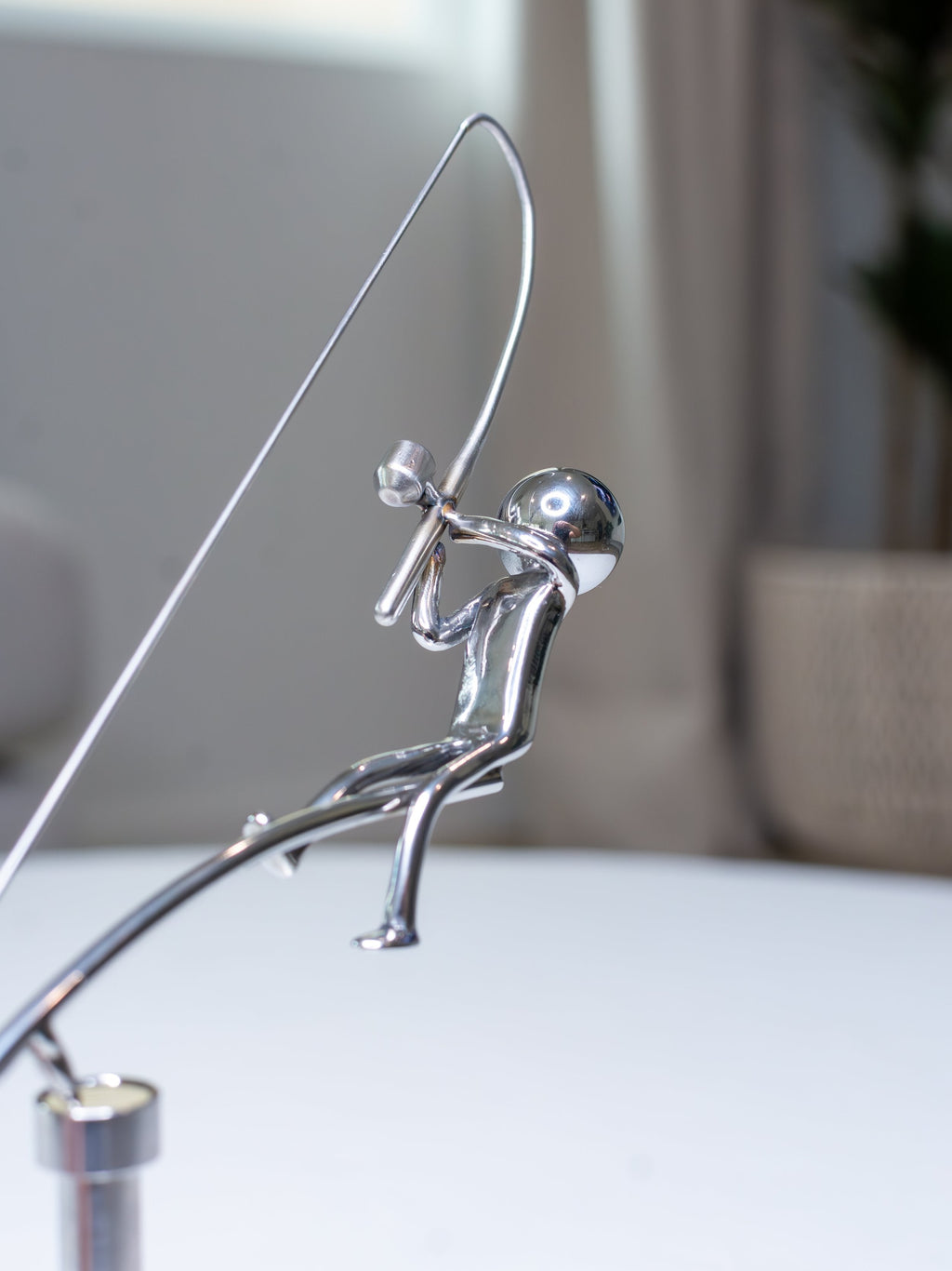 🎣Skulpturen med balanserende fisker