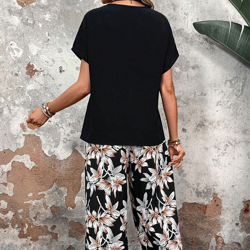 🏆HEIT SALG 49 % RABATT🔥Avslappet sett med vide ben og korte ermer med blomsterprint til dame